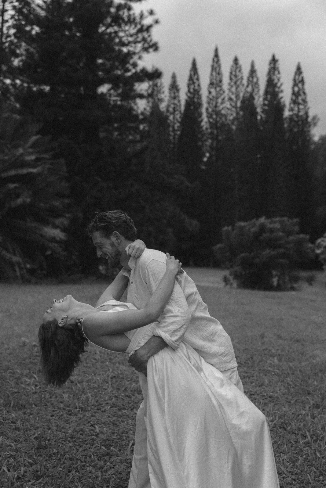 Carley & Tommy — a dip embrace, black and white film