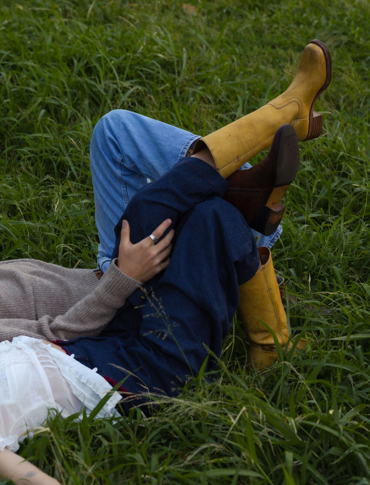 Claire & Jordan — lying together in the grass