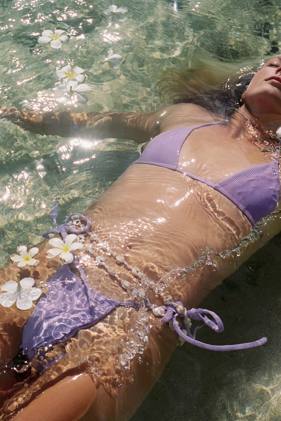 floating in clear shallow water