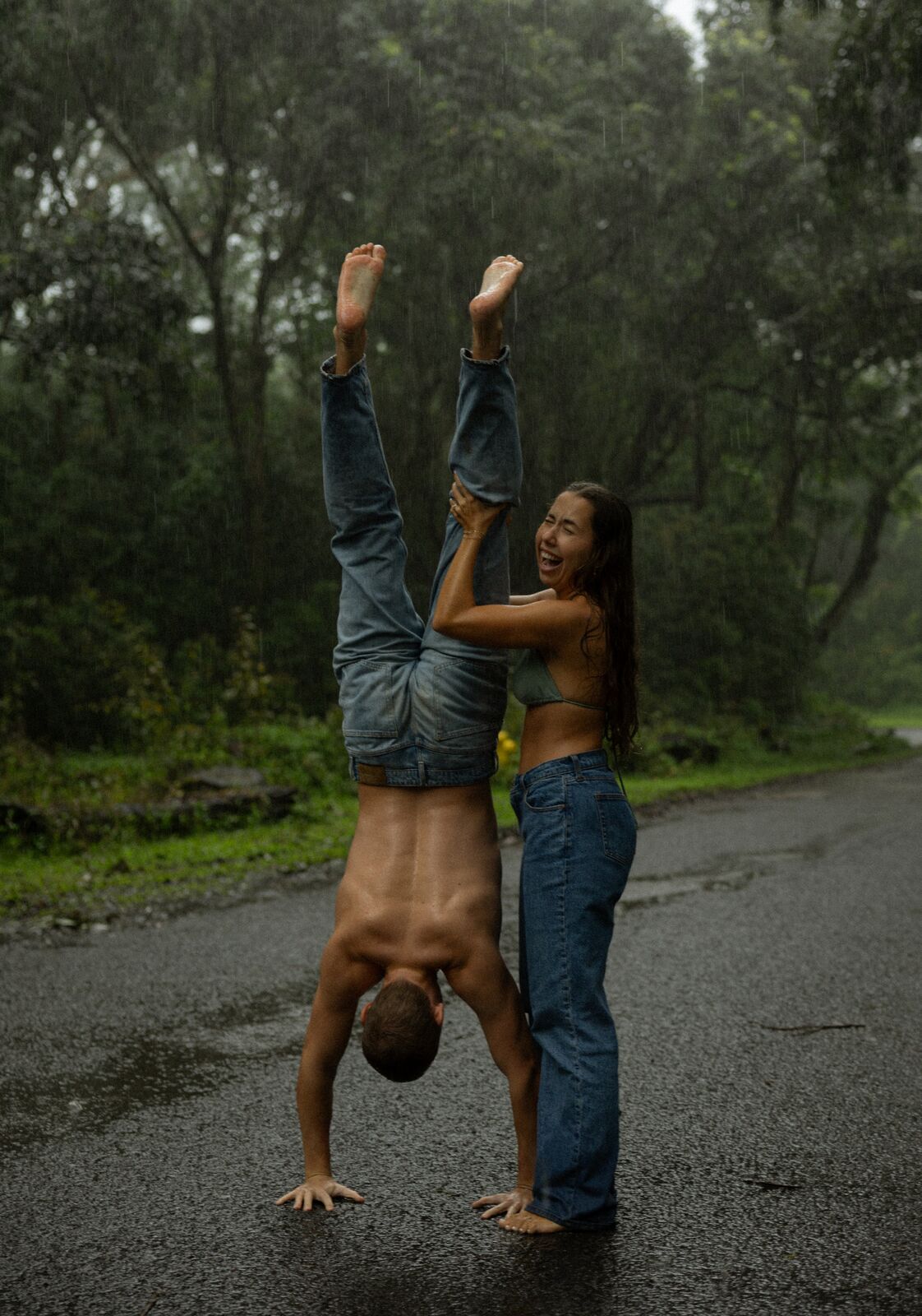 Noa & Mason — a handstand on the wet pavement