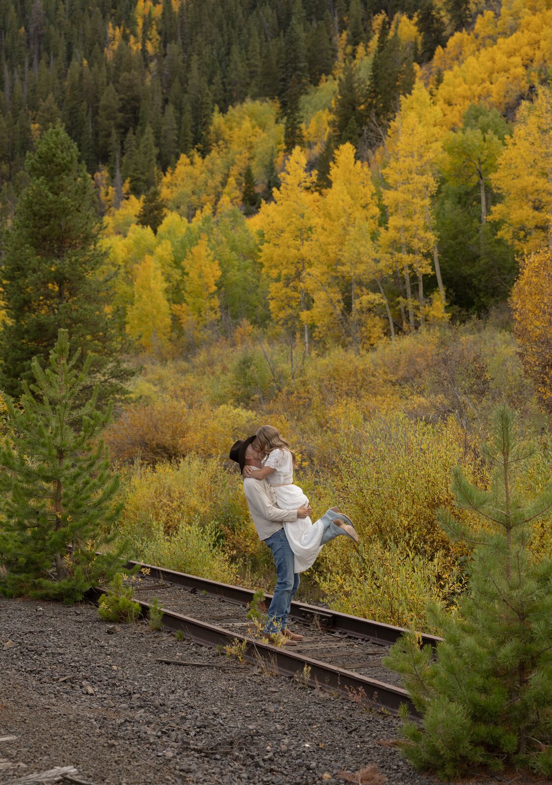 Shannon & Will — a golden aspen hillside